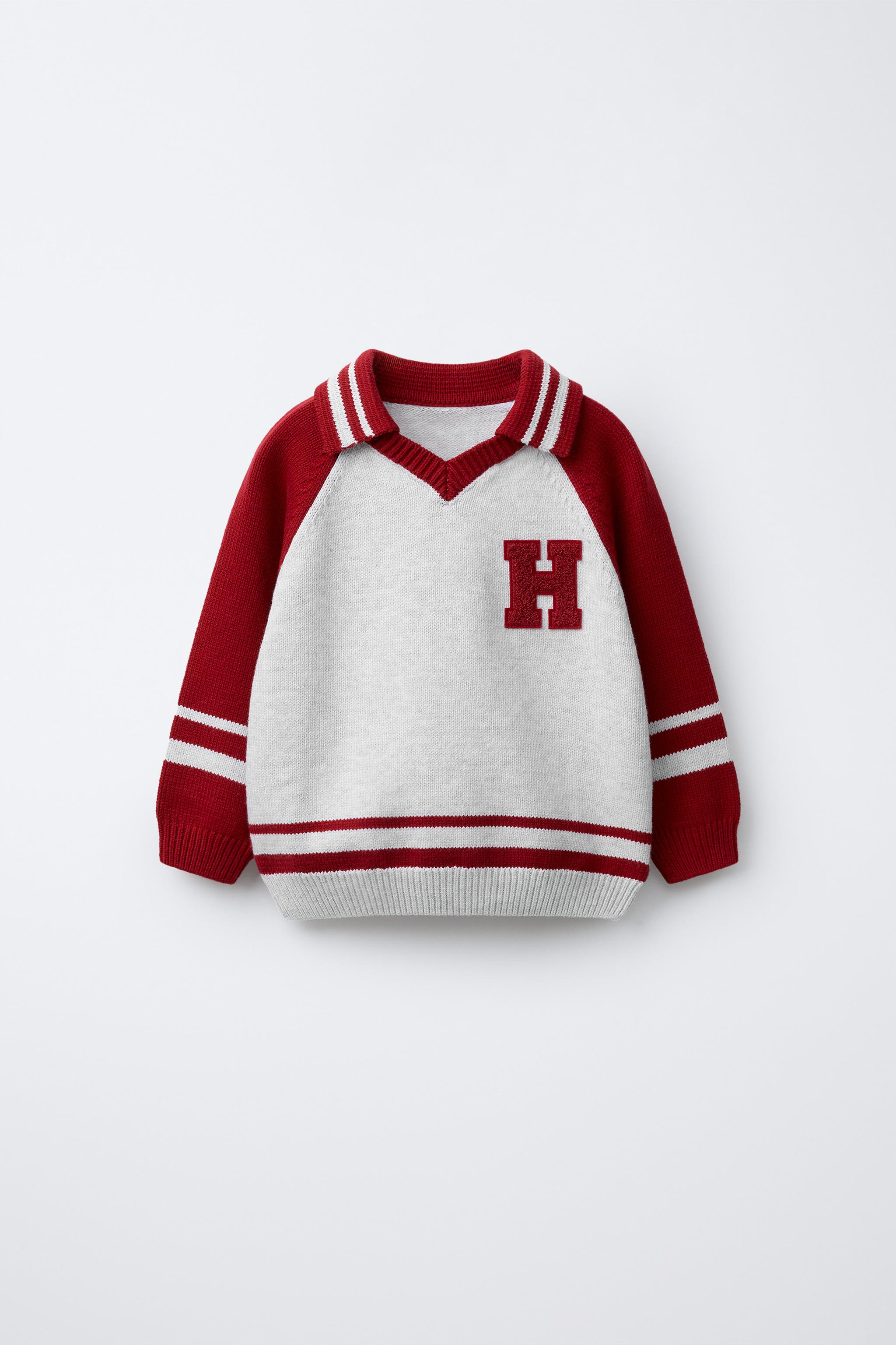 POLO EN MAILLE AVEC PIÈCE VARSITY